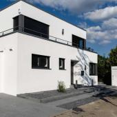 Zwei HPL Gartenhäuser vor moderner Architektur in 41450 Dormagen Kostenanfrage