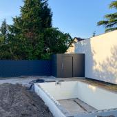 Modernes Poolhaus mit Schiebetür aus HPL Kostenanfrage