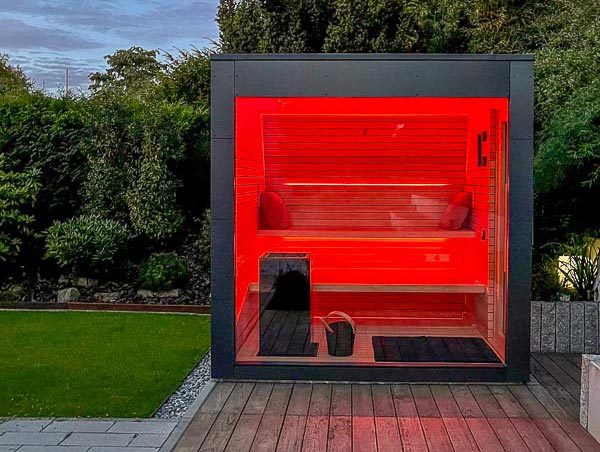 Outdoor sauna with integrated LED lighting
