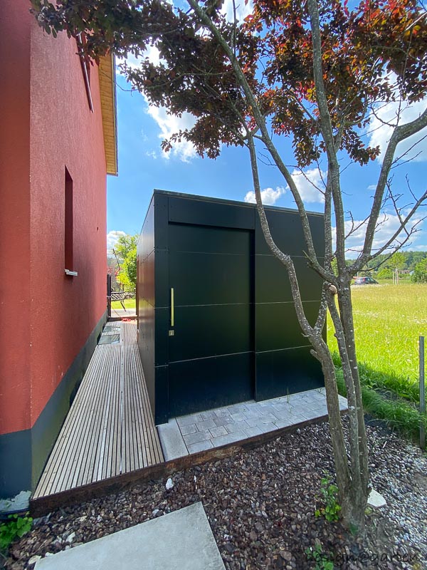 Designer wellness in the garden: sauna garden shed with panoramic glazing