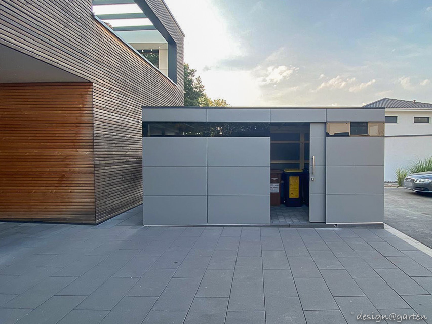 Architect-designed garden shed with flat roof as a modern storage solution in the Frankfurt area