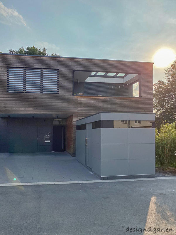 Architect-designed garden shed with flat roof as a modern storage solution in the Frankfurt area