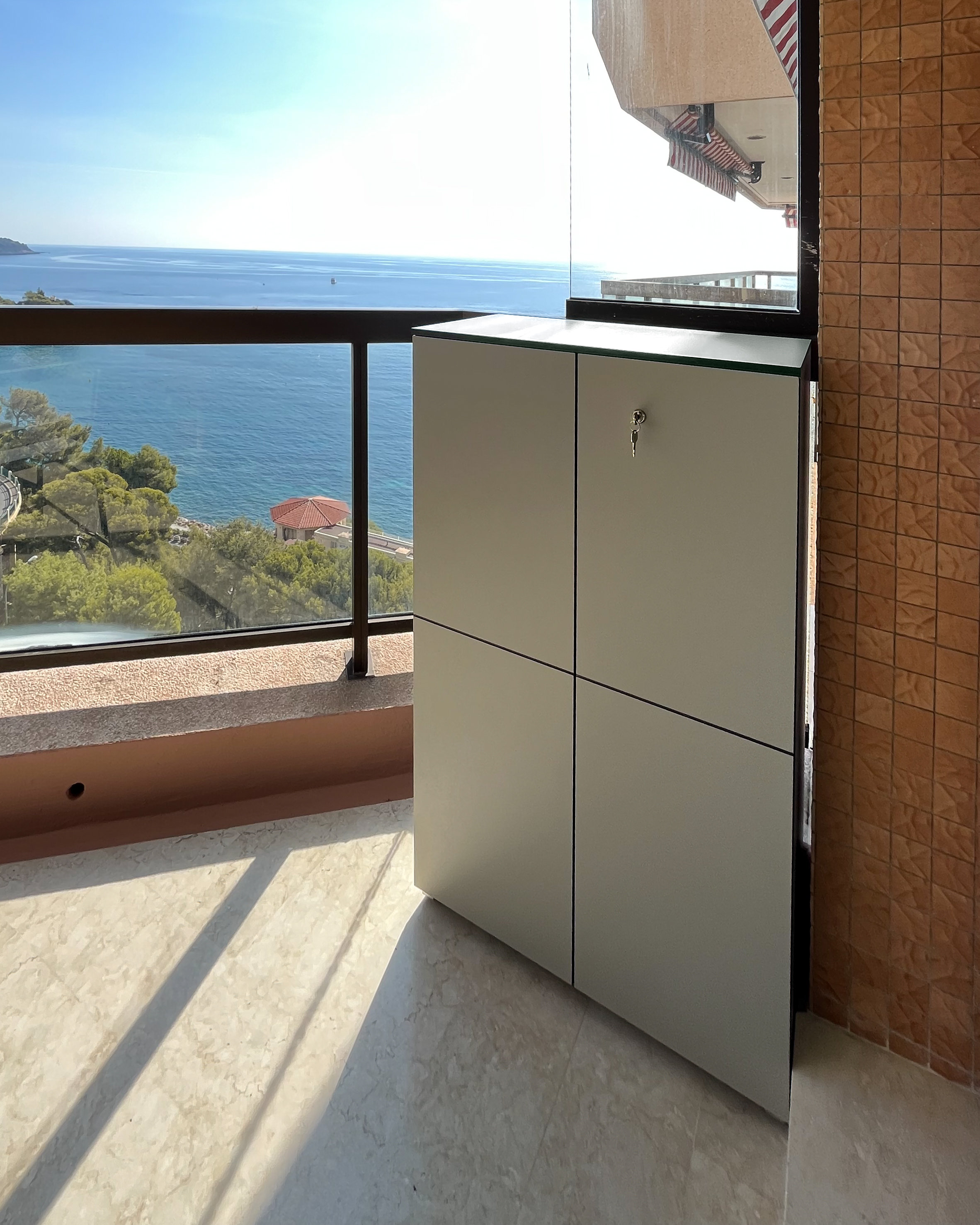 Grey balcony cabinet on a gorgeous balcony in Monaco 1