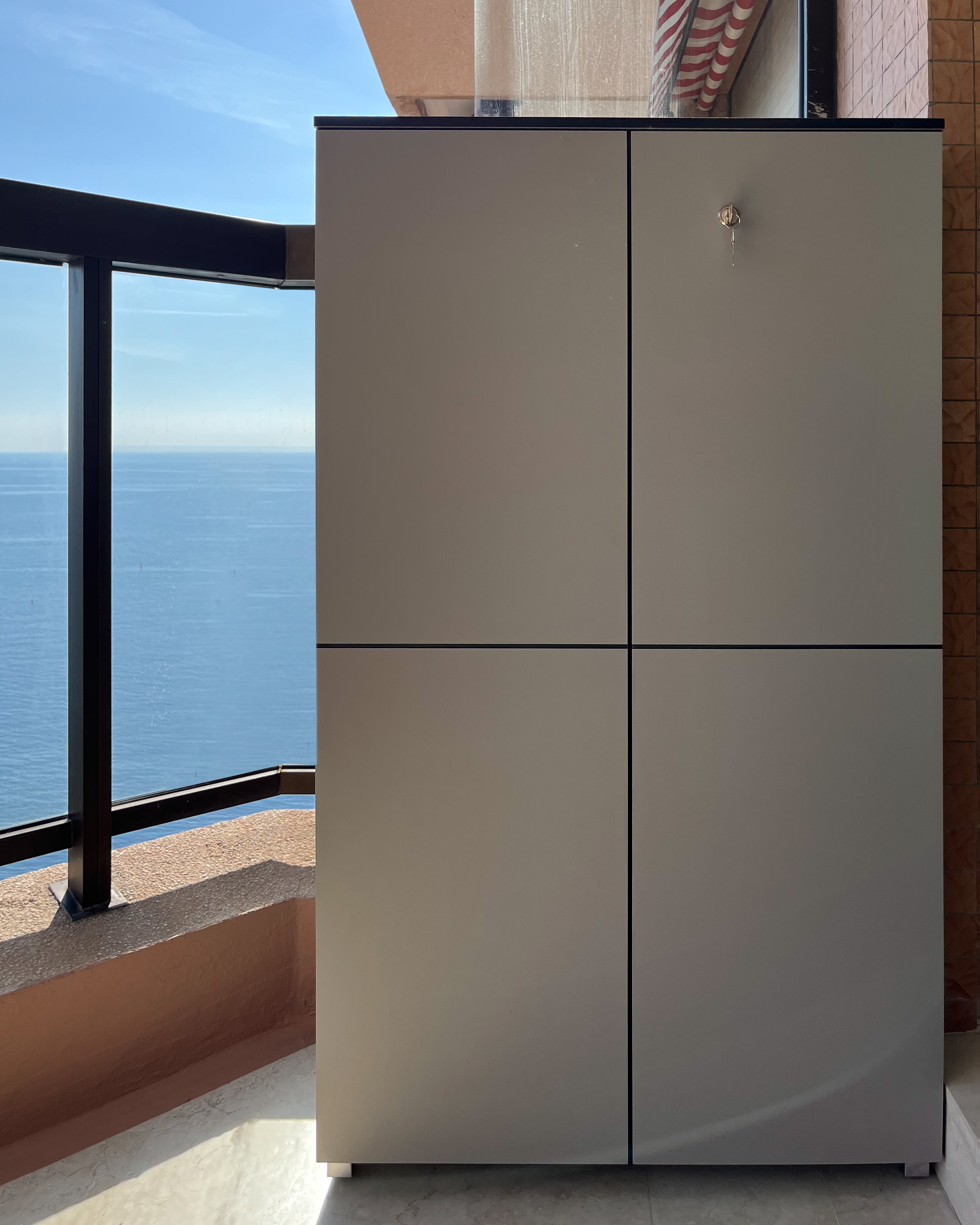 Grey balcony cabinet on a gorgeous balcony in Monaco 2