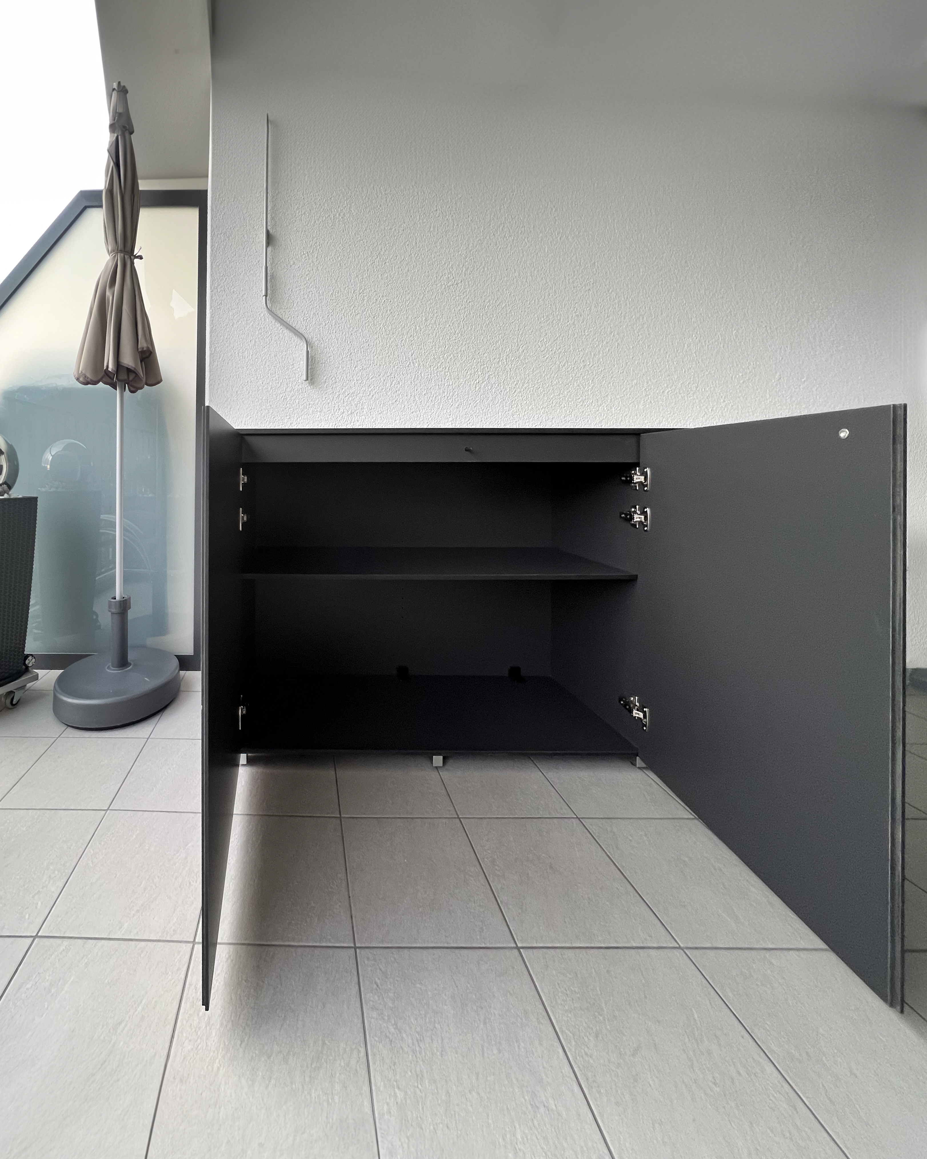 Weatherproof patio cabinet for cushions in anthracite 1