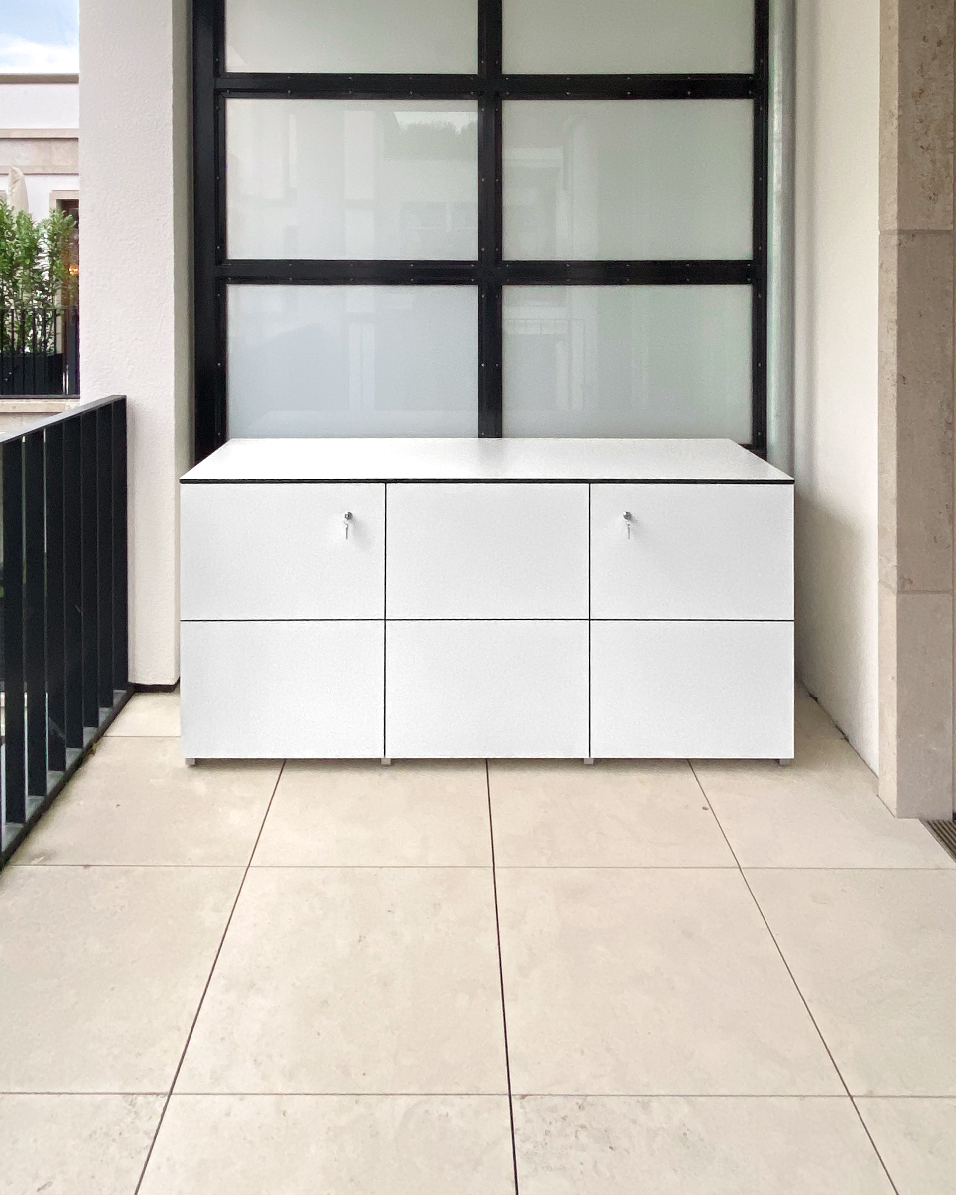 Stylish architect-designed outdoor cabinet made of HPL in a linear design 2
