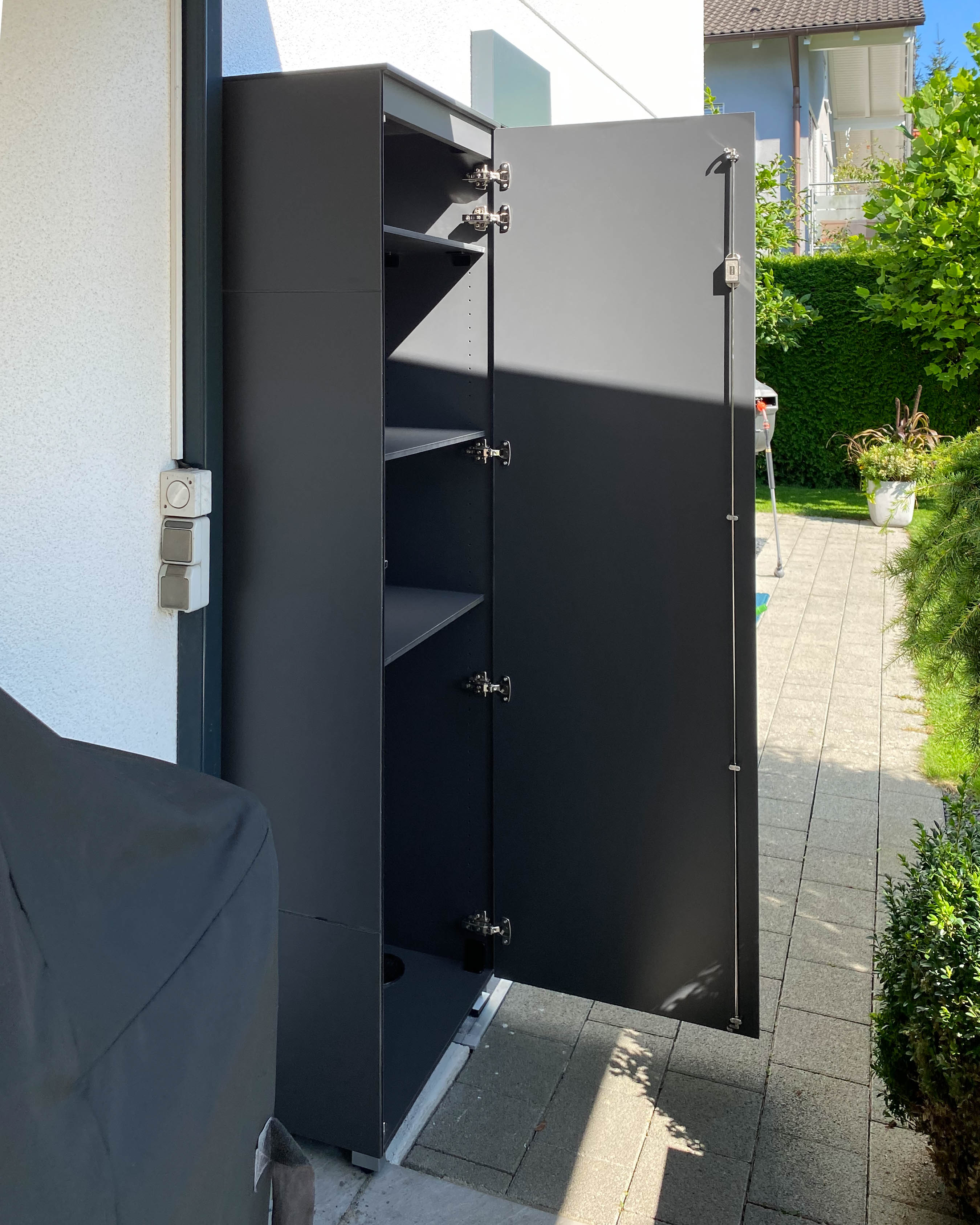 Narrow garden cabinet with ample storage space 2