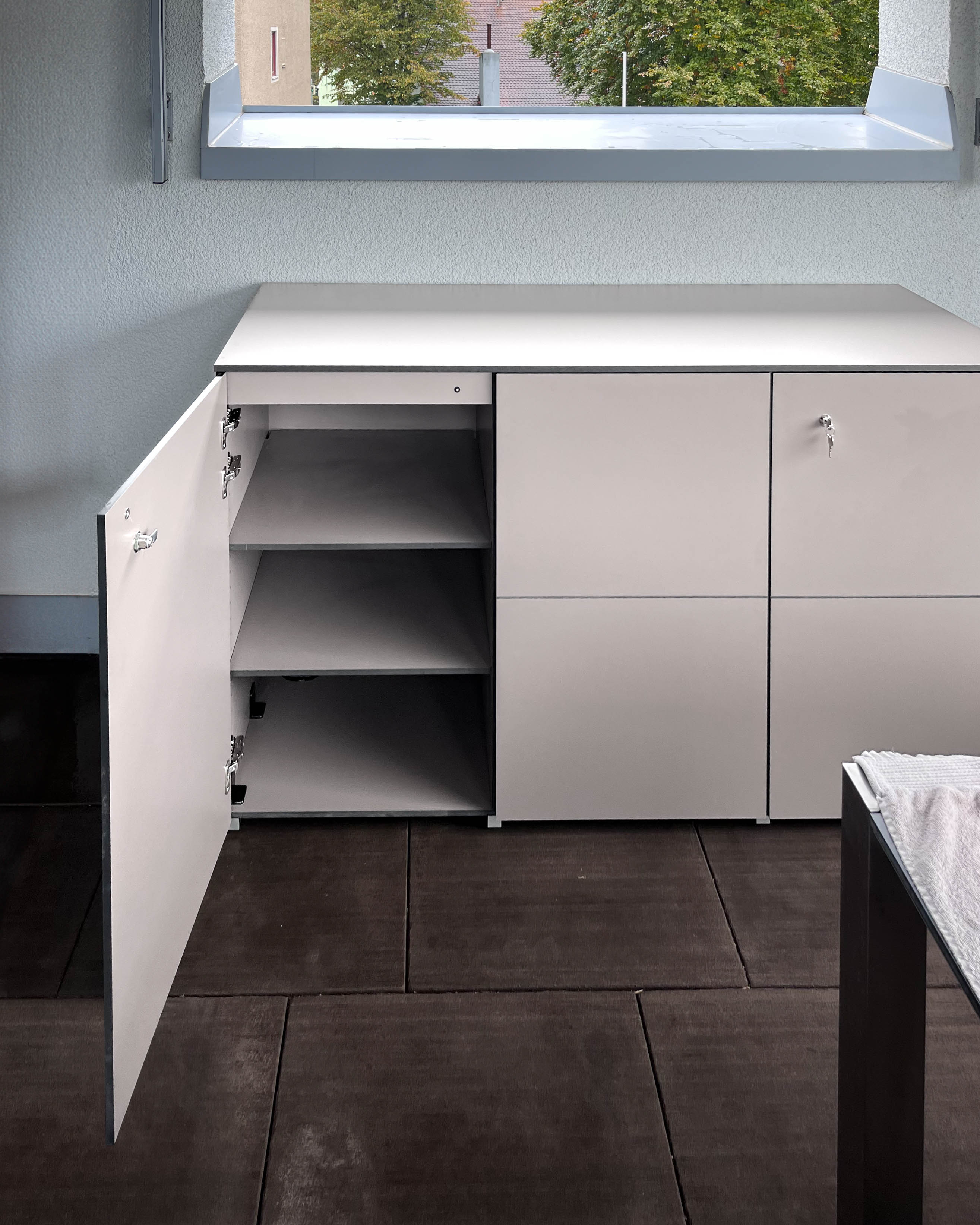 Silver-grey sideboard for the balcony made of HPL 1