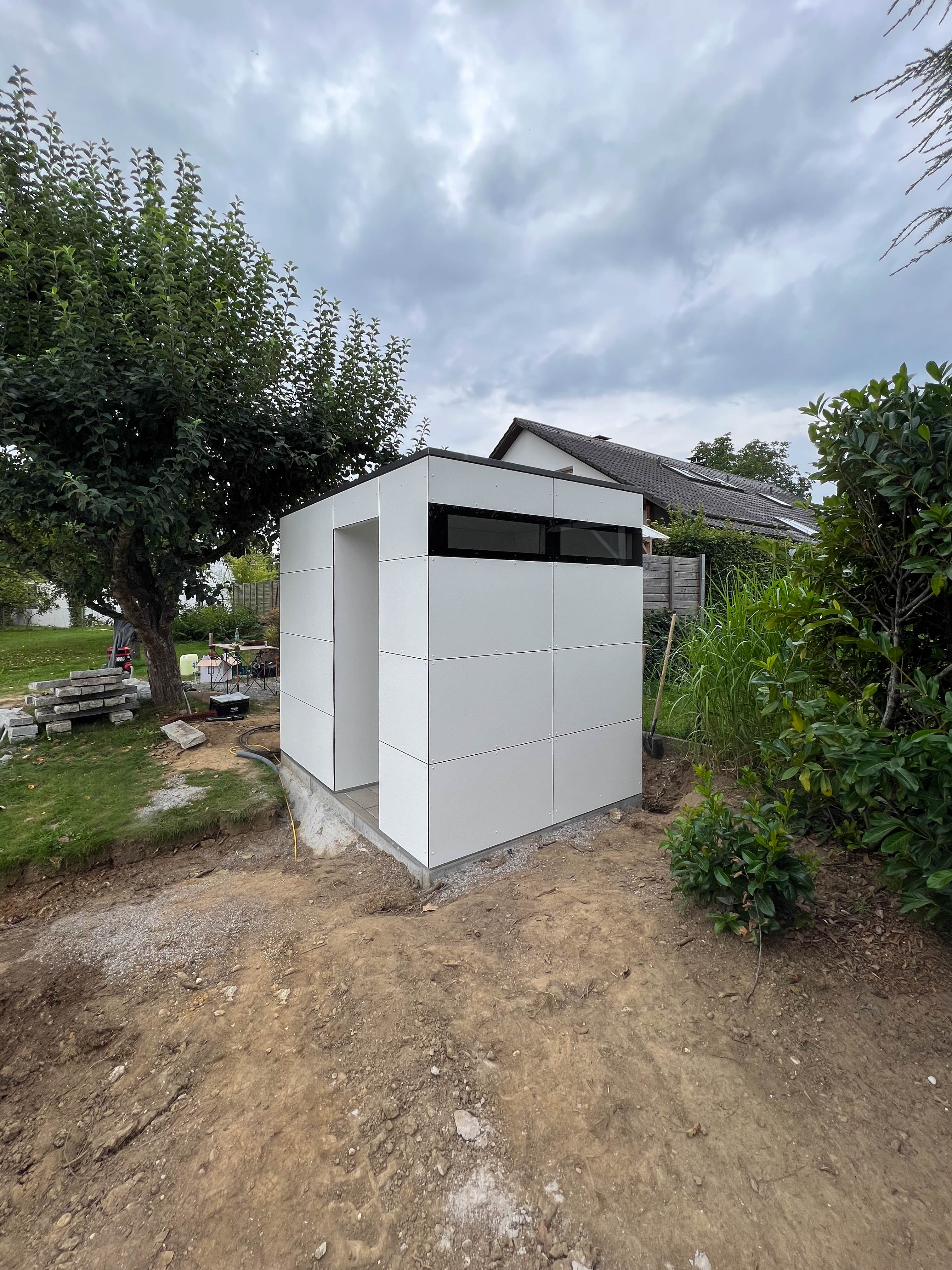 Garden shed with outdoor shower and pool equipment 1