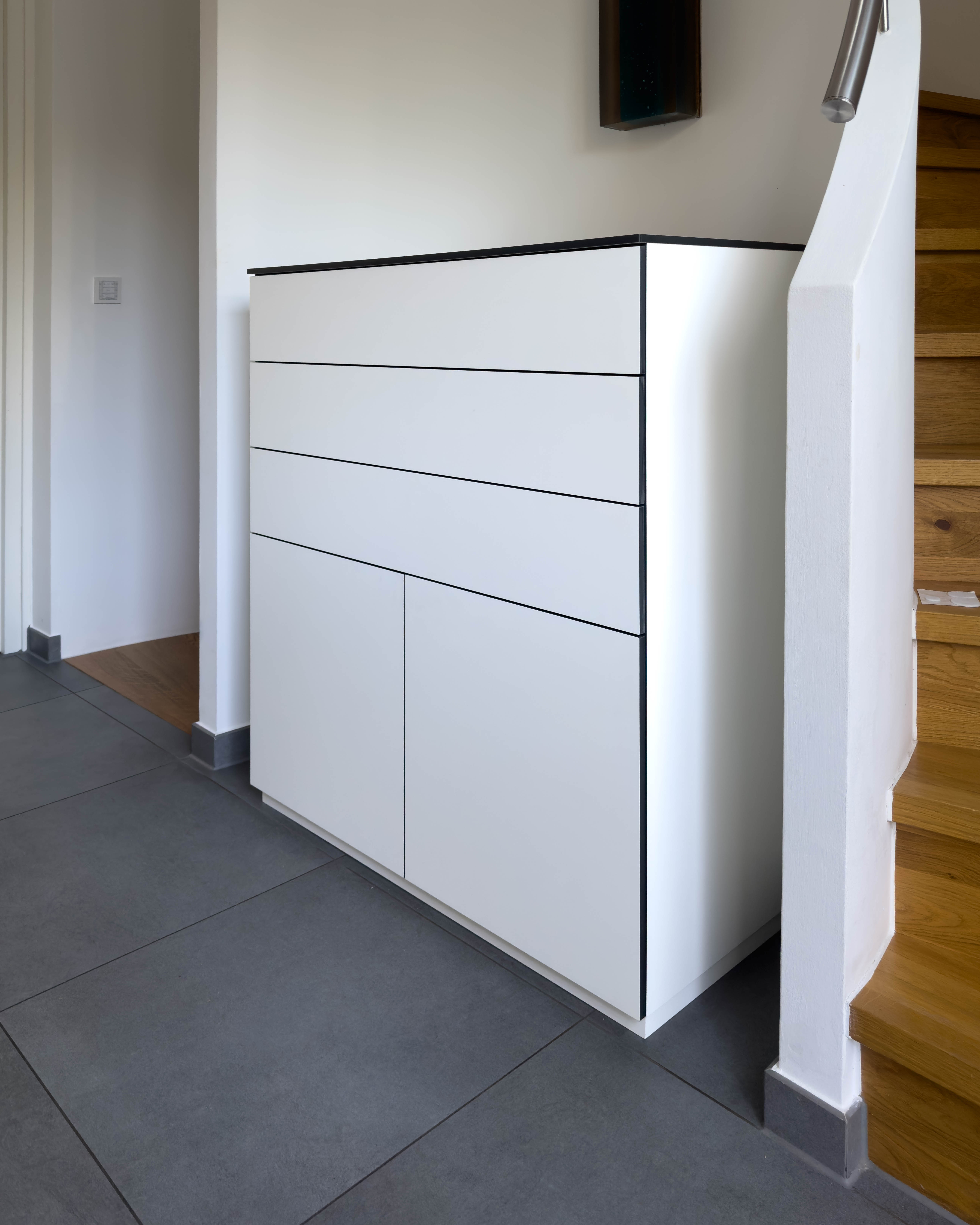 Custom-made cabinet made of HPL in white 1