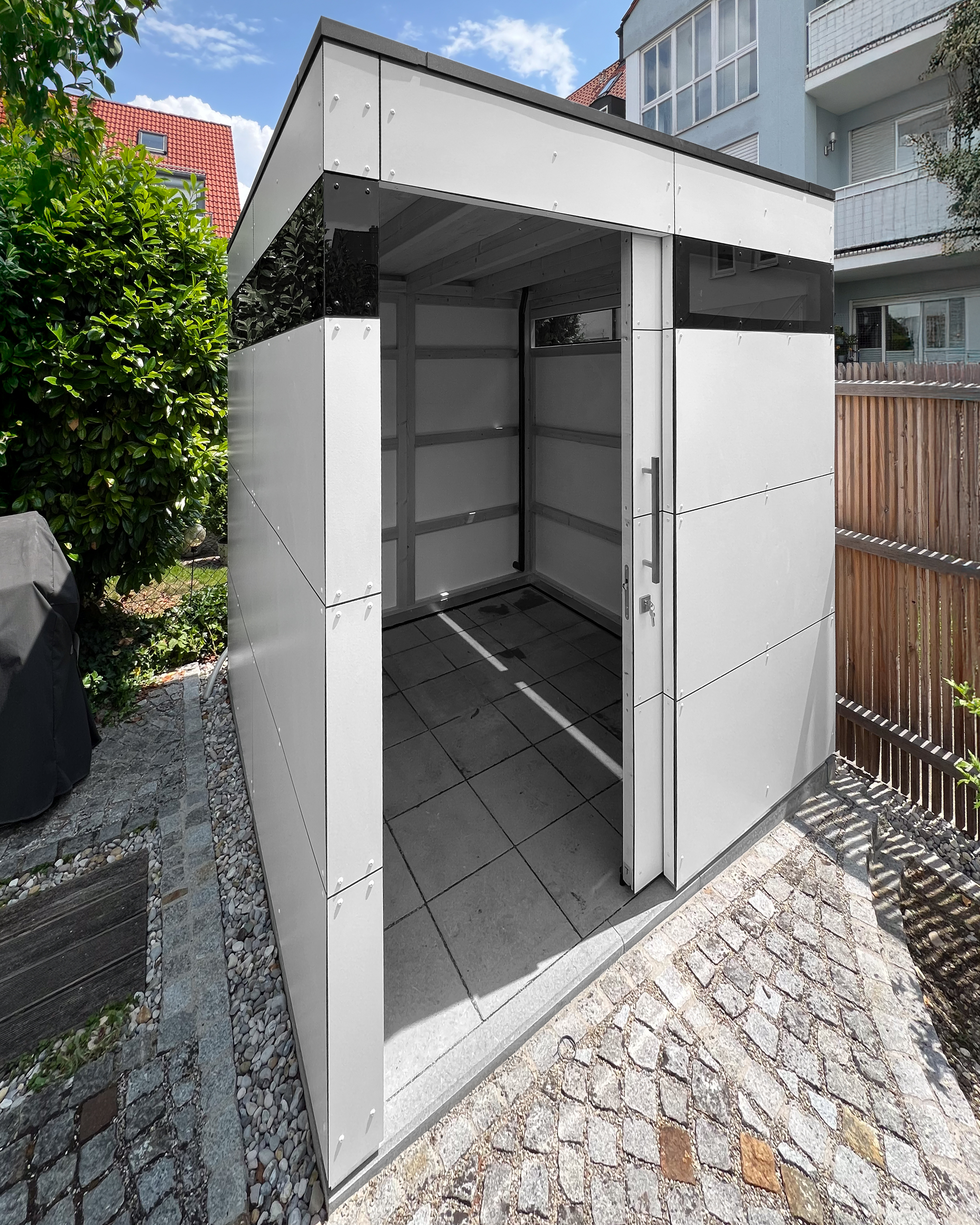 Spacious garden shed in white 1