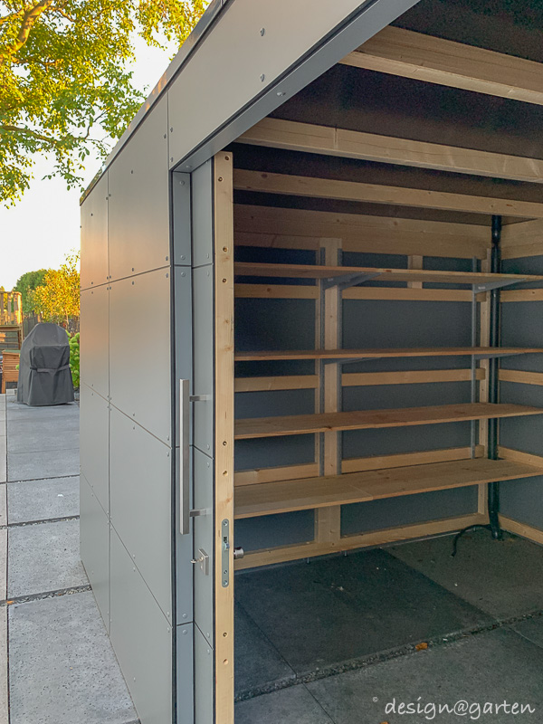 Caseta de jardín con almacén para leña: solución arquitectónica al estilo Bauhaus 6