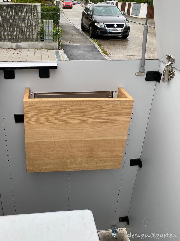 Contenedor para cubos de basura  de HPL para 4 cubos de 240 litros con buzón y caja para paquetes 1