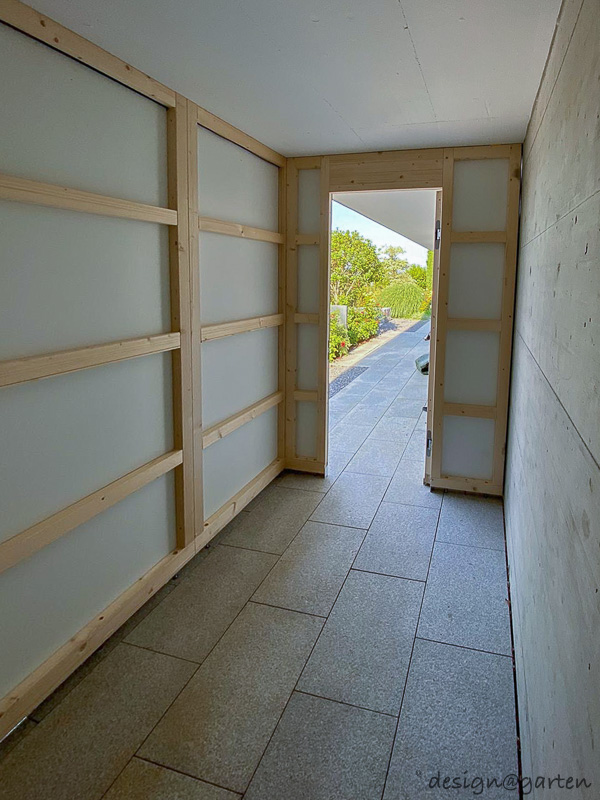 Abri de jardin cubiste à toit plat, solution double au bord du lac de Zurich