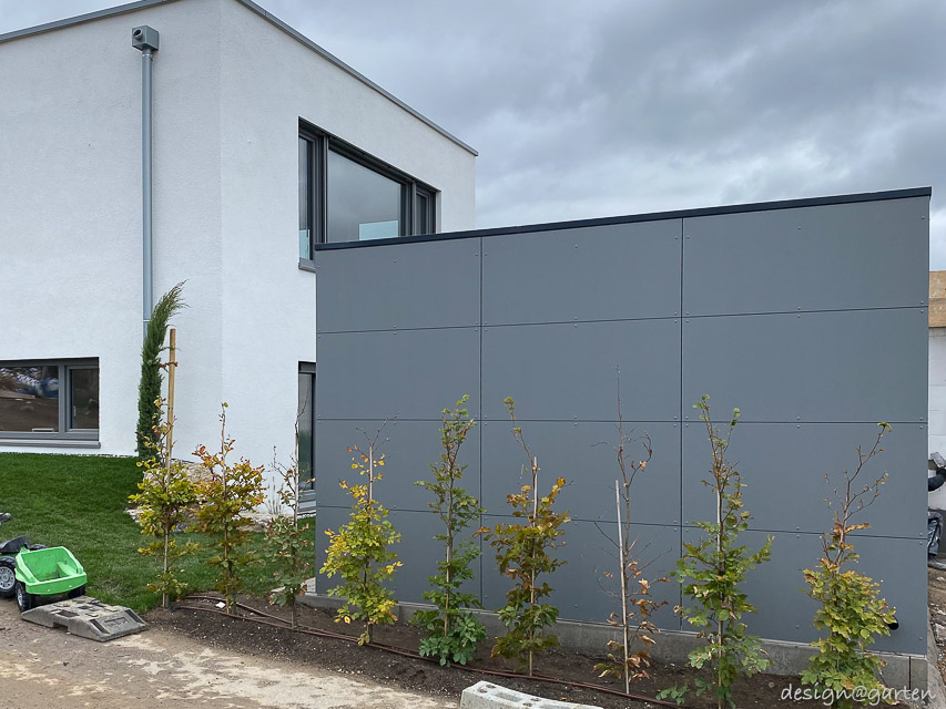 Abri de jardin épuré pour une architecture moderne : efficacité et protection contre les intempéries 9