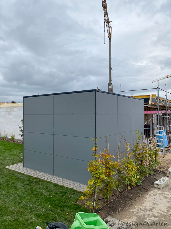 Abri de jardin épuré pour une architecture moderne : efficacité et protection contre les intempéries 3