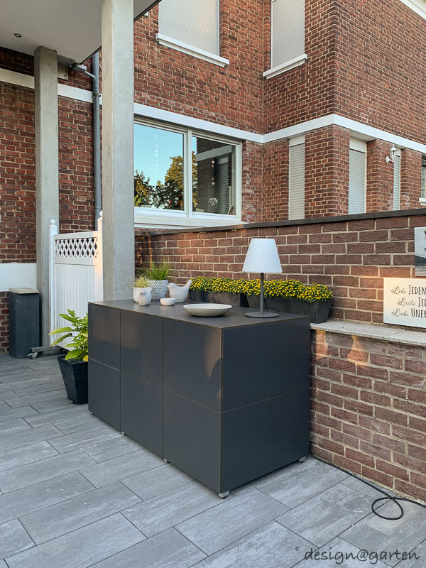 Un mélange de matériaux élégant : l'armoire de jardin, un élément décoratif qui attire le regard dans votre espace extérieur 3