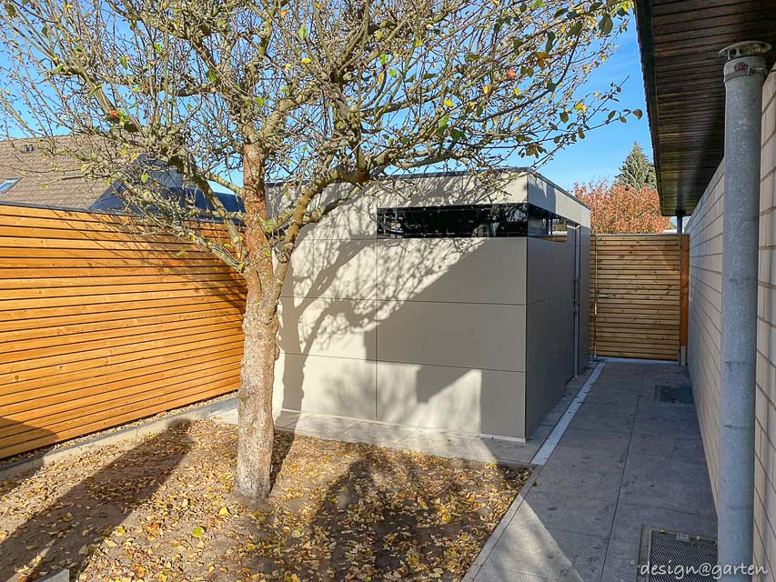 Abri de jardin moderne : intégration harmonieuse et précision technique