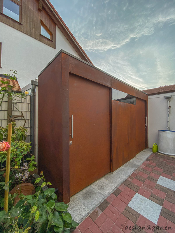 Casetta da giardino Cube in acciaio Corten – Oggetto di design su misura per il giardino