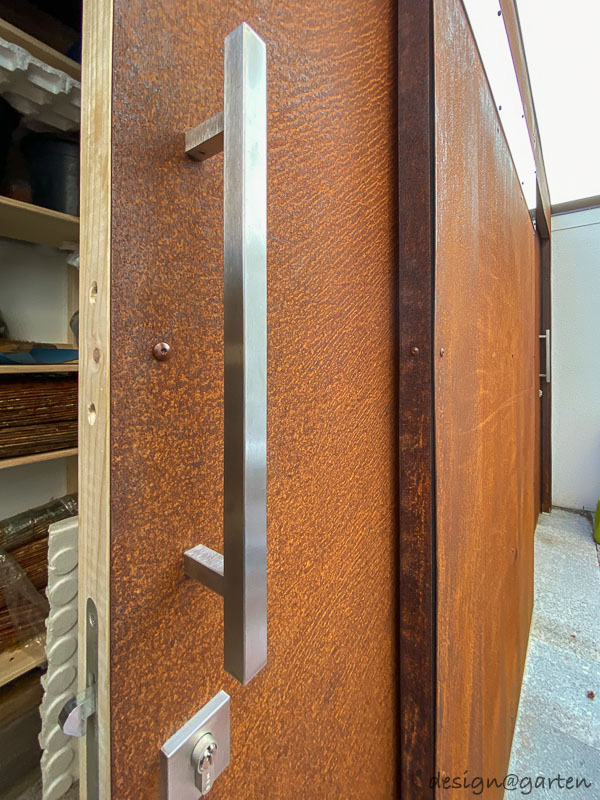 Casetta da giardino Cube in acciaio Corten – Oggetto di design su misura per il giardino